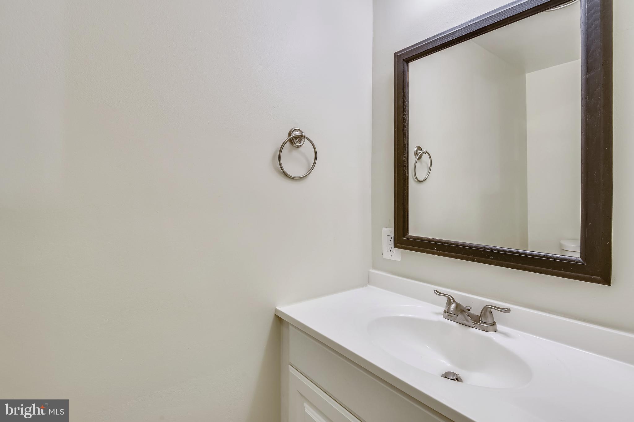 11077 Saffold Way Reston, VA 20190 - Photo 30 of 30 Main Level Half Bath Off Kitchen
