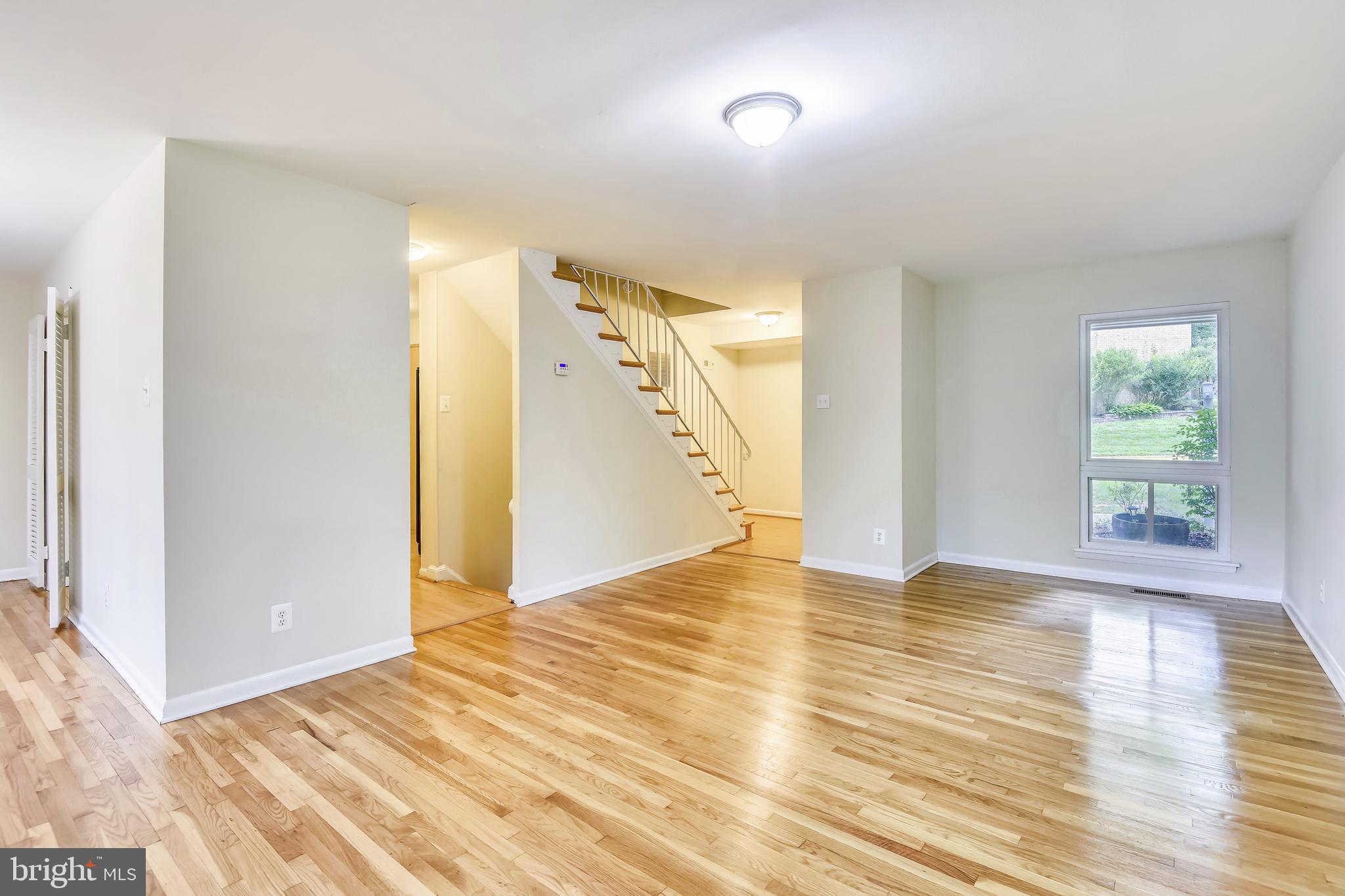 11077 Saffold Way Reston, VA 20190 - Photo 6 of 30 Living Room View From Rear