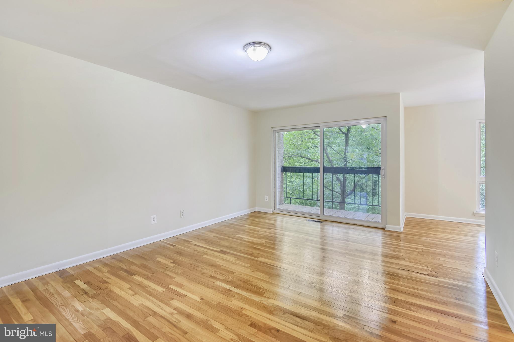 11077 Saffold Way Reston, VA 20190 - Photo 7 of 30 Living Room View From Foyer