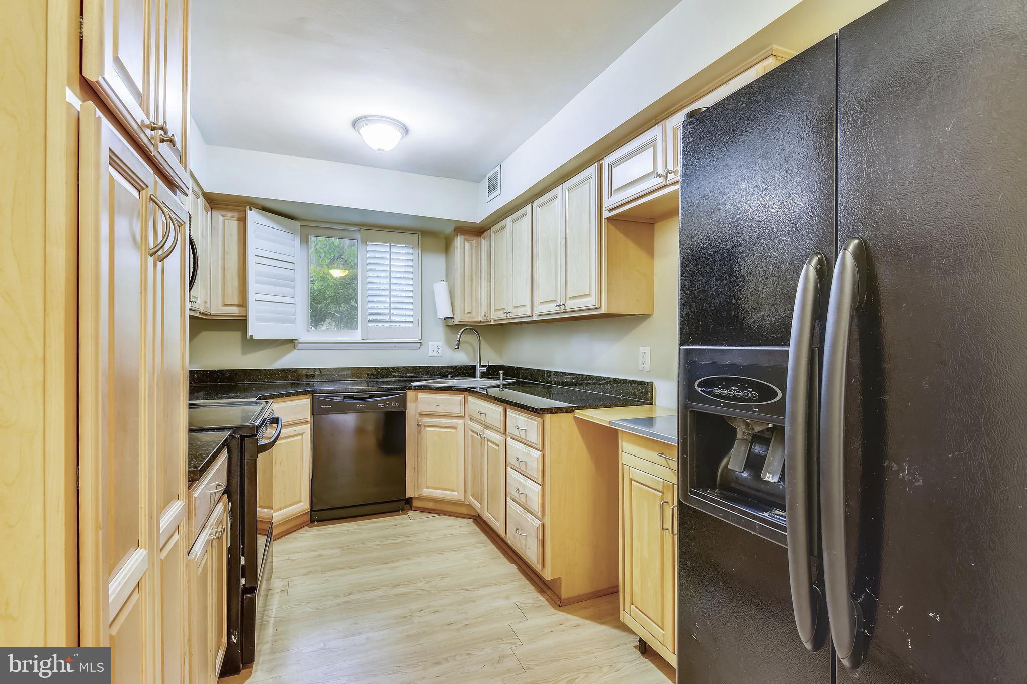 11077 Saffold Way Reston, VA 20190 - Photo 10 of 30 Updated Cabinets and Granite Counters
