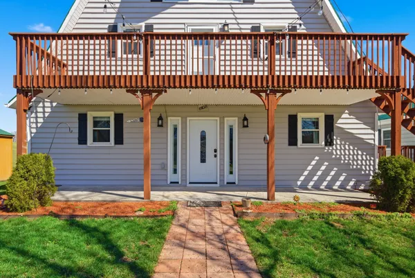 a front view of a house with shower