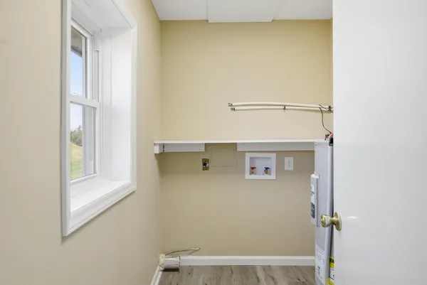a bathroom with a sink and toilet