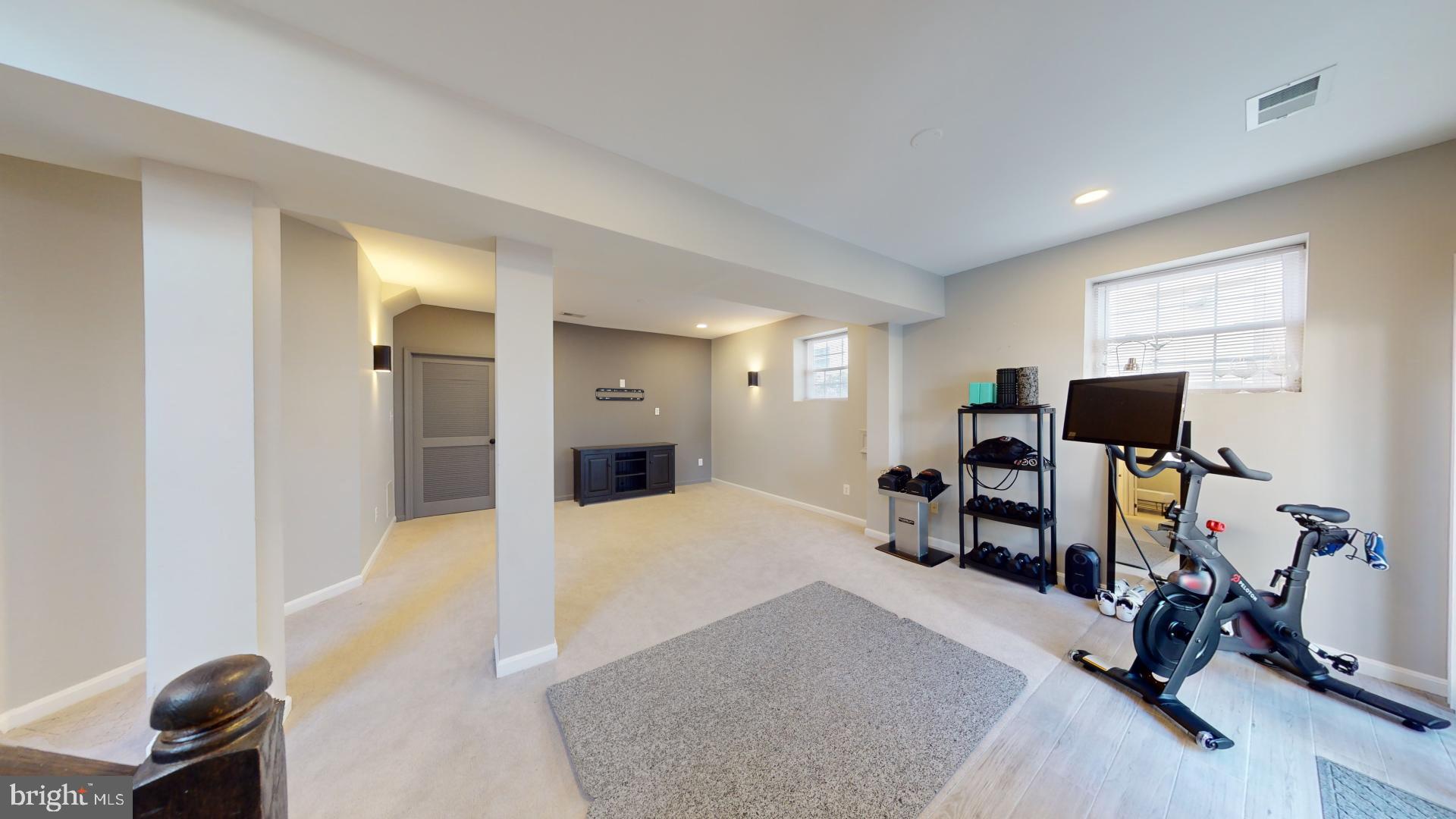 25405 Chicama Drive Chantilly, VA 20152 - Photo 18 of 44 a view of a livingroom with workspace and a window