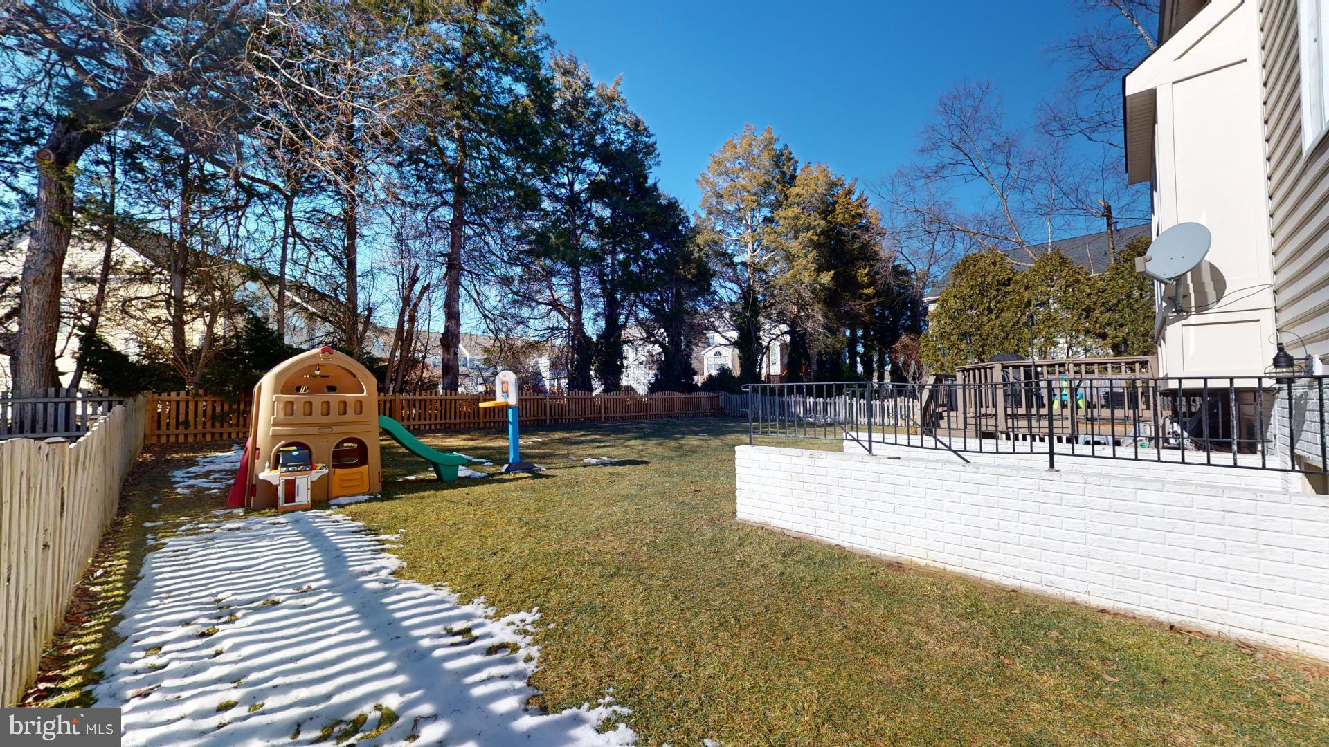 25405 Chicama Drive Chantilly, VA 20152 - Photo 41 of 44 a view of a yard with a slide