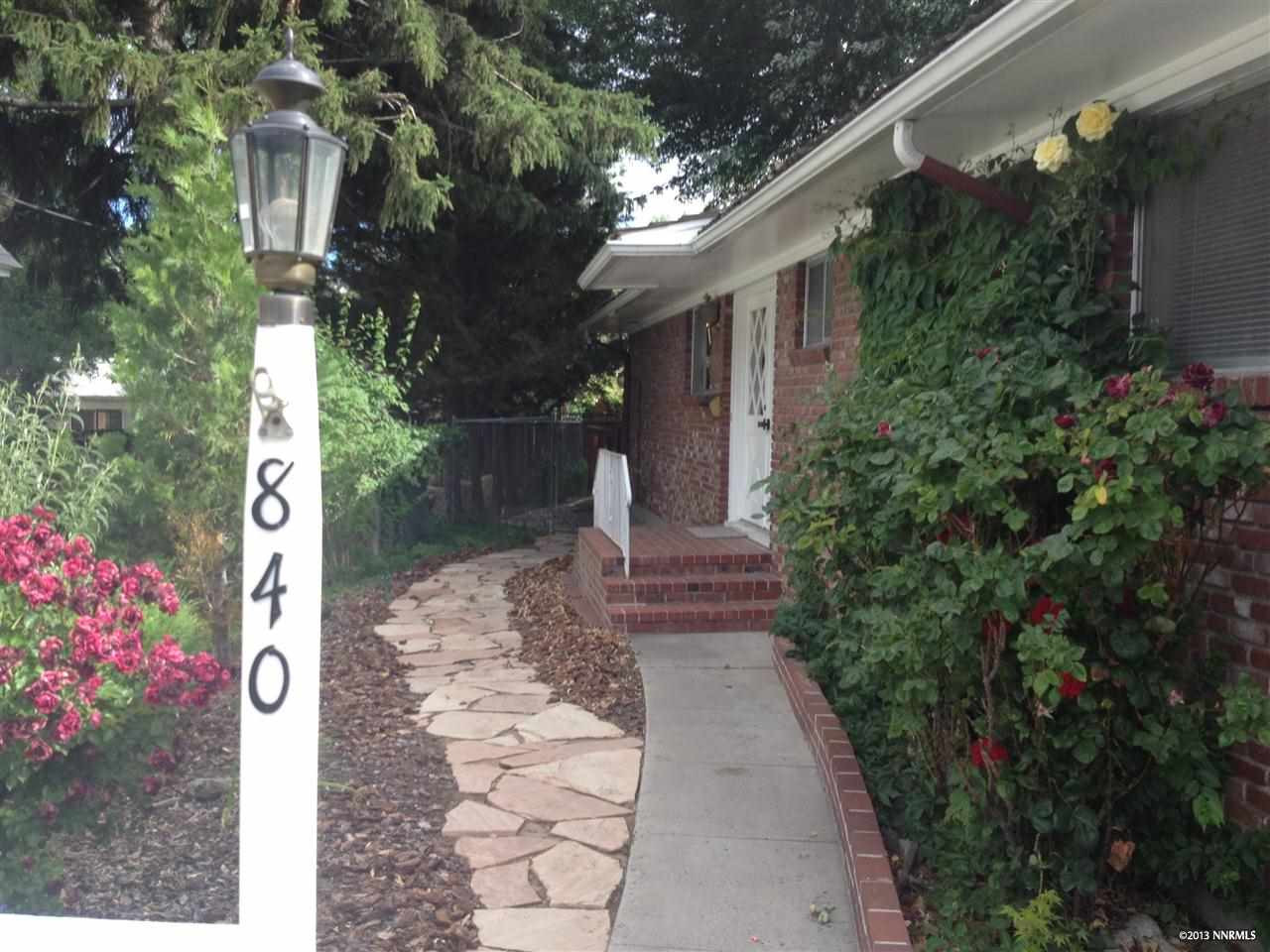 840 Brown Street Reno, NV 89509 - Photo 1 of 1 a view of a pathway with house on both side