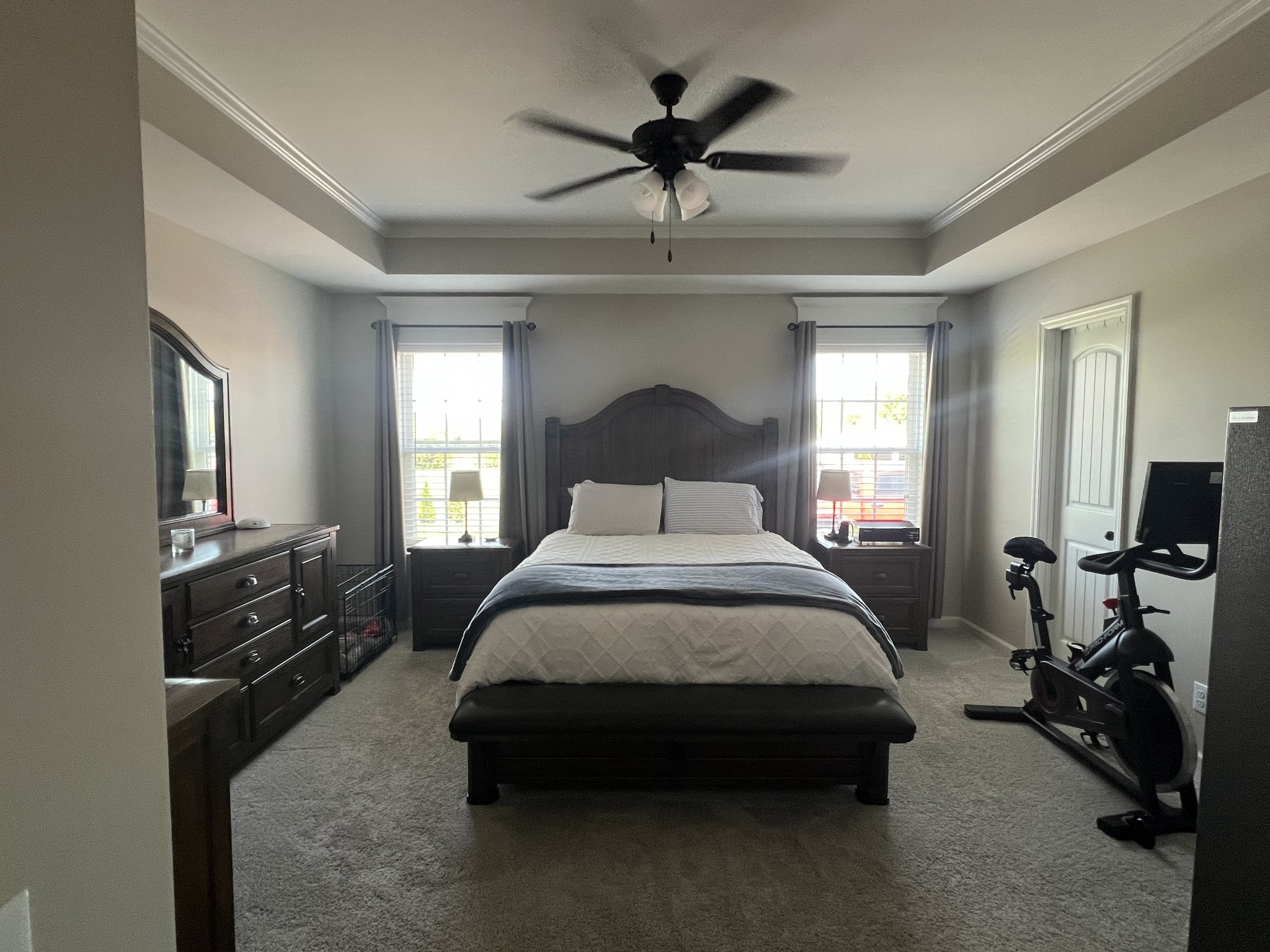 546 Corinth Road Portland, TN 37148 - Photo 29 of 37 a spacious bedroom with a bed and a chandelier