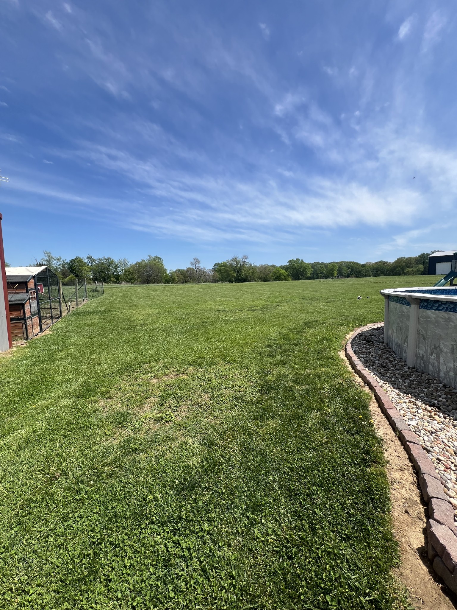 546 Corinth Road Portland, TN 37148 - Photo 7 of 37 a view of a lake with houses in the back
