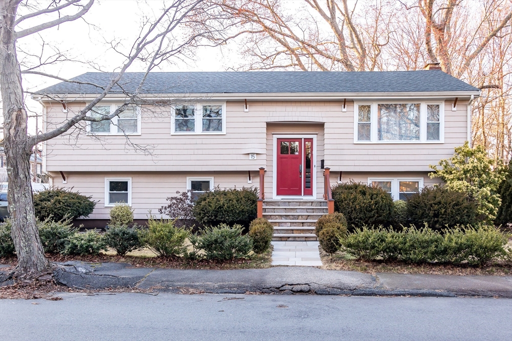 15 Higgins Road Marblehead, MA 01945 - Photo 1 of 26 a front view of a house with a garden