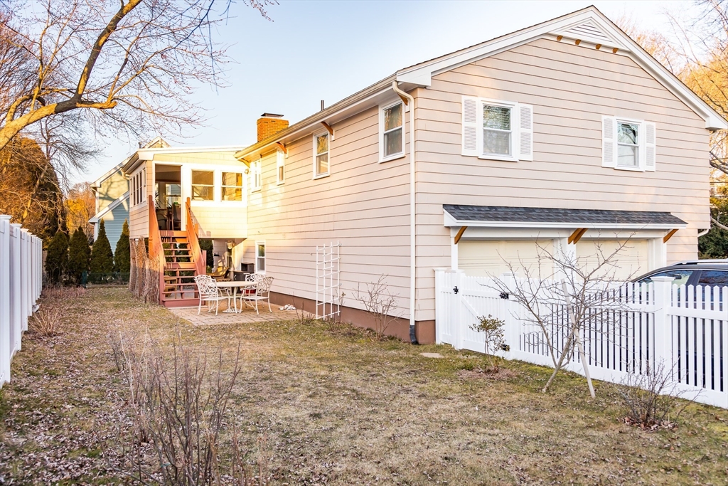 15 Higgins Road Marblehead, MA 01945 - Photo 24 of 26 a view of a house with backyard and sitting area