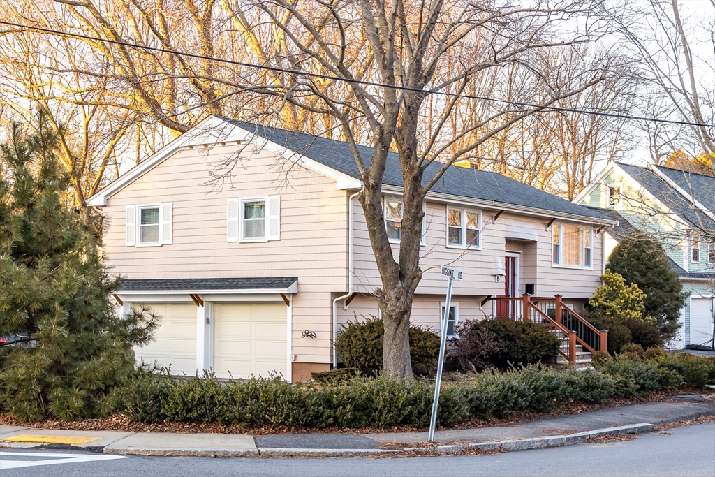 15 Higgins Road Marblehead, MA 01945 - Photo 26 of 26 a front view of a house with a yard and garage