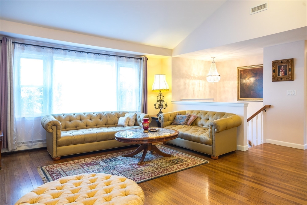 15 Higgins Road Marblehead, MA 01945 - Photo 5 of 26 a living room with furniture and a large window