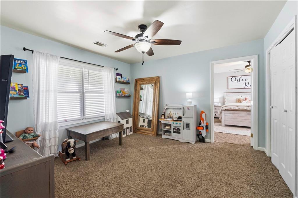 2777 Chickadee Drive Monroe, GA 30655 - Photo 27 of 36 a view of a livingroom with furniture and a window