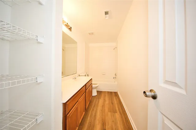 a bathroom with a sink and a shower