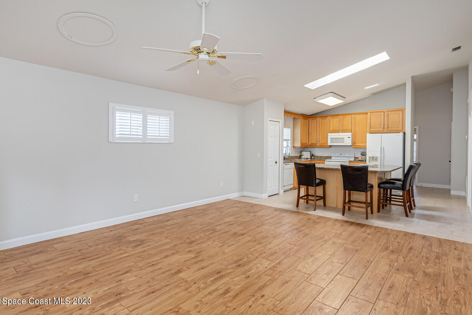 1041 South Fork Circle Melbourne, FL 32901 - Photo 12 of 62 a view of a dining room with furniture and chandelier