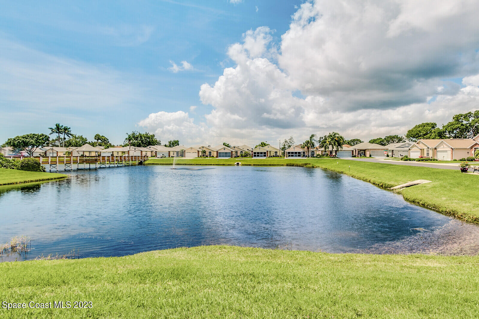 1041 South Fork Circle Melbourne, FL 32901 - Photo 48 of 62 a view of a swimming pool with an ocean view