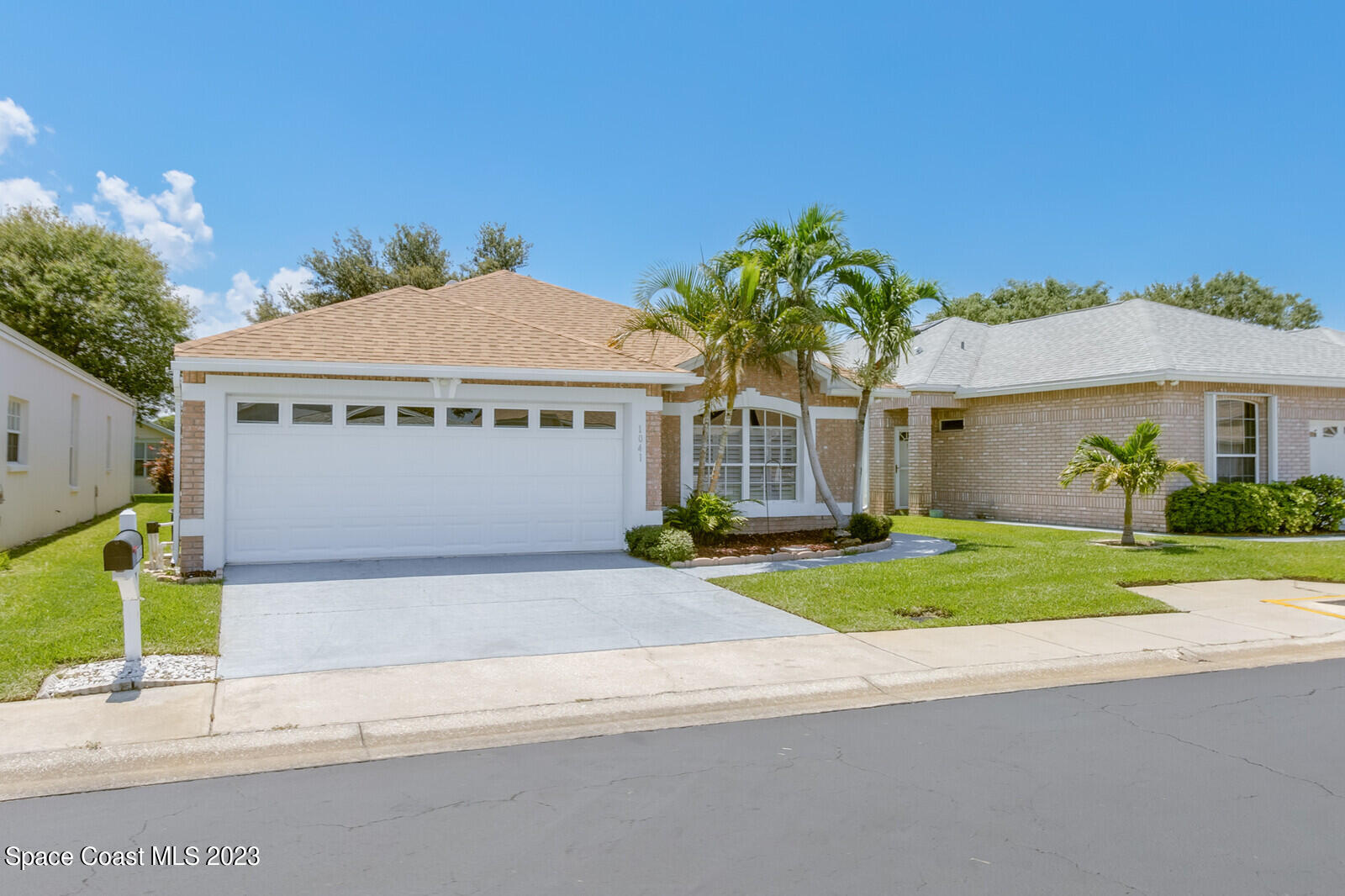 1041 South Fork Circle Melbourne, FL 32901 - Photo 62 of 62 front view of a house with a yard