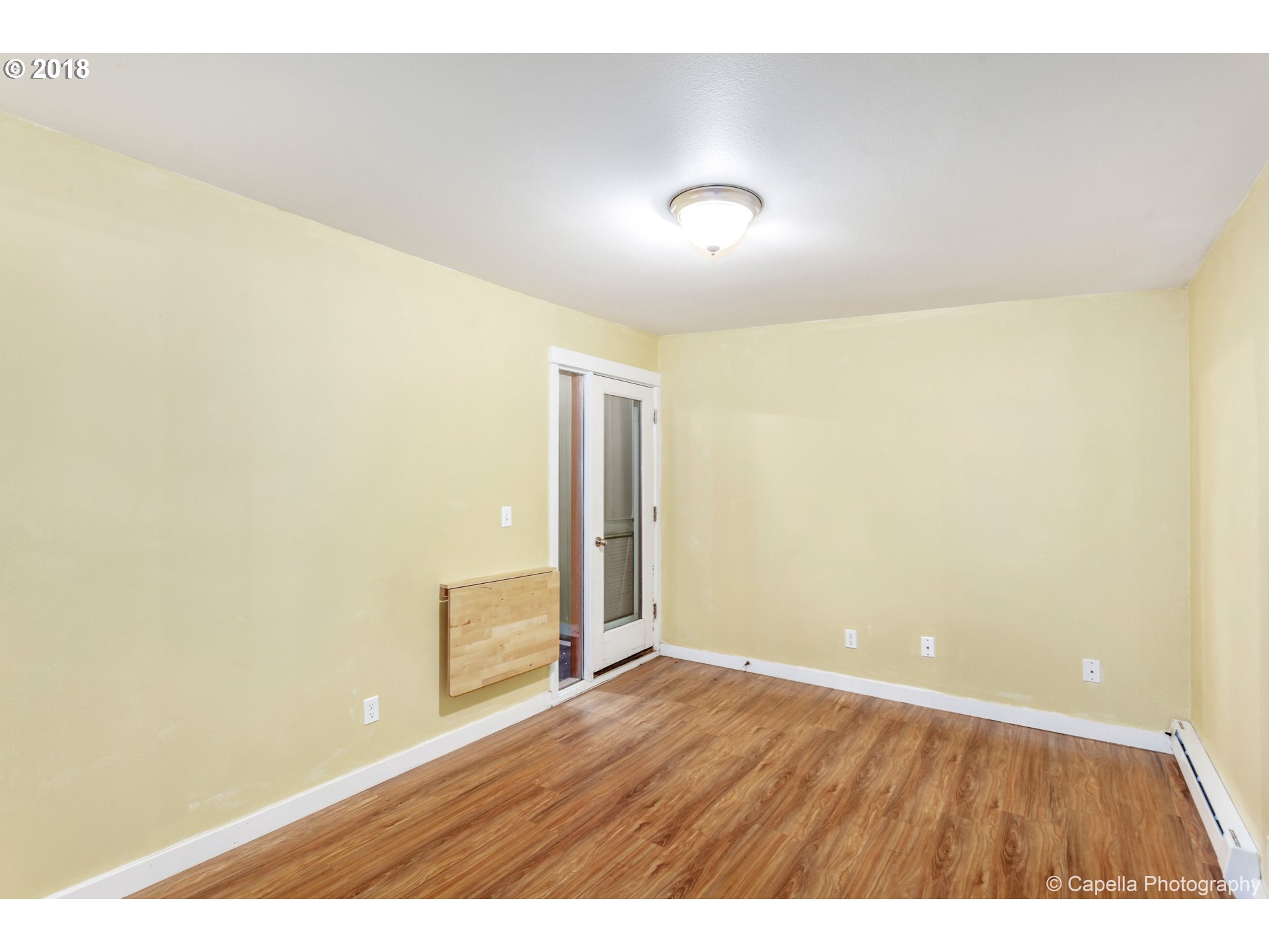 6220 Southwest Capitol Highway, Unit 8 Portland, OR 97239 - Photo 11 of 13 view of an empty room