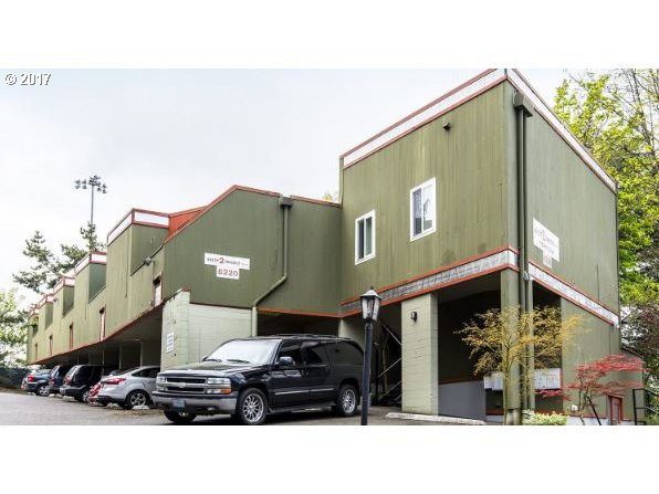 6220 Southwest Capitol Highway, Unit 8 Portland, OR 97239 - Photo 2 of 13 a black and white building with outdoor space