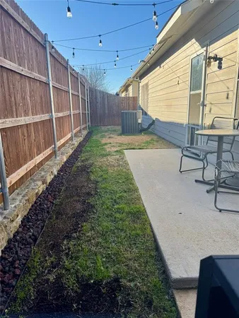 a view of a backyard with stairs