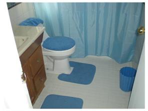 18 Judson Street, Unit 22A Edison, NJ 08837 - Photo 2 of 10 a bathroom with a sink and a toilet