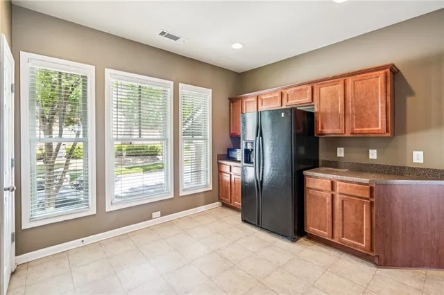 a view of a balcony with wooden floor