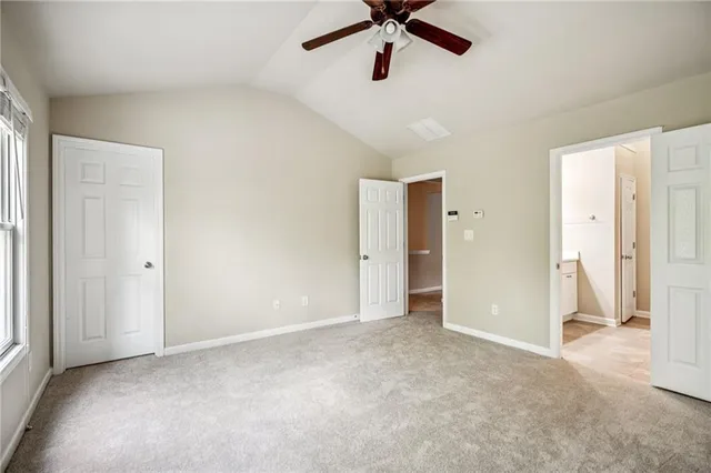 a bathroom with a tub and shower