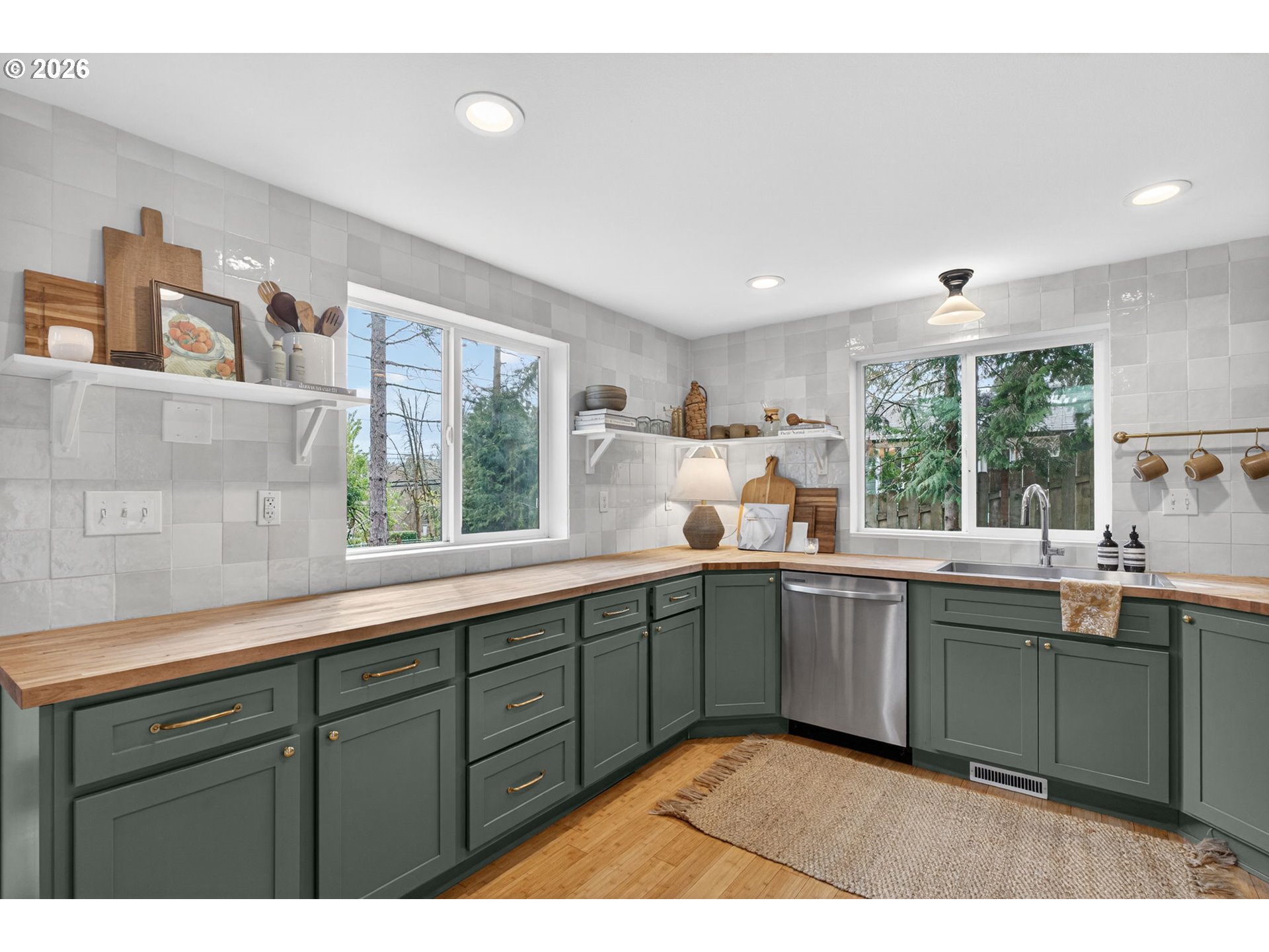 9843 Southwest 2nd Avenue Portland, OR 97219 - Photo 12 of 38 a kitchen with a sink and window