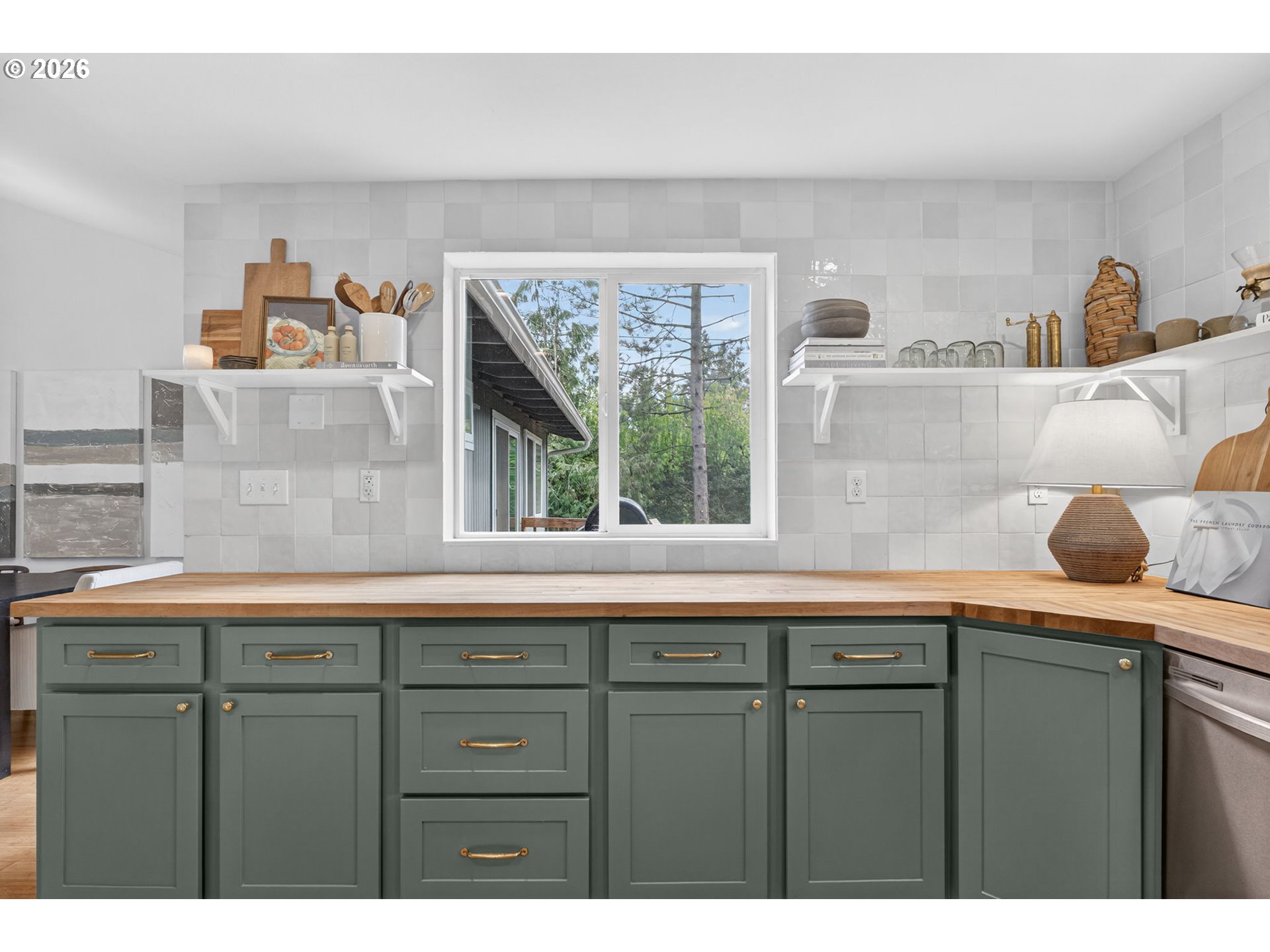 9843 Southwest 2nd Avenue Portland, OR 97219 - Photo 13 of 38 a kitchen with a sink and a window