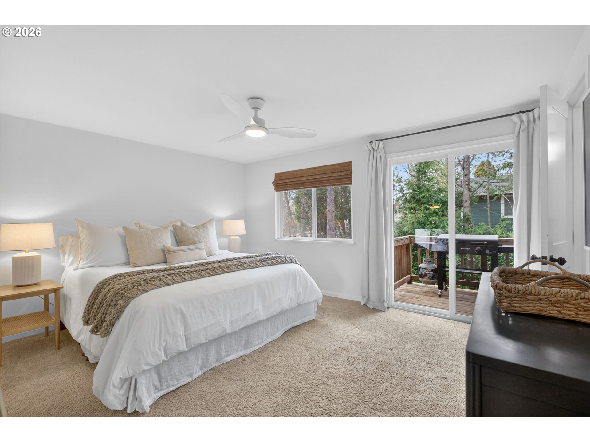 9843 Southwest 2nd Avenue Portland, OR 97219 - Photo 18 of 38 a bedroom with a bed and a large window