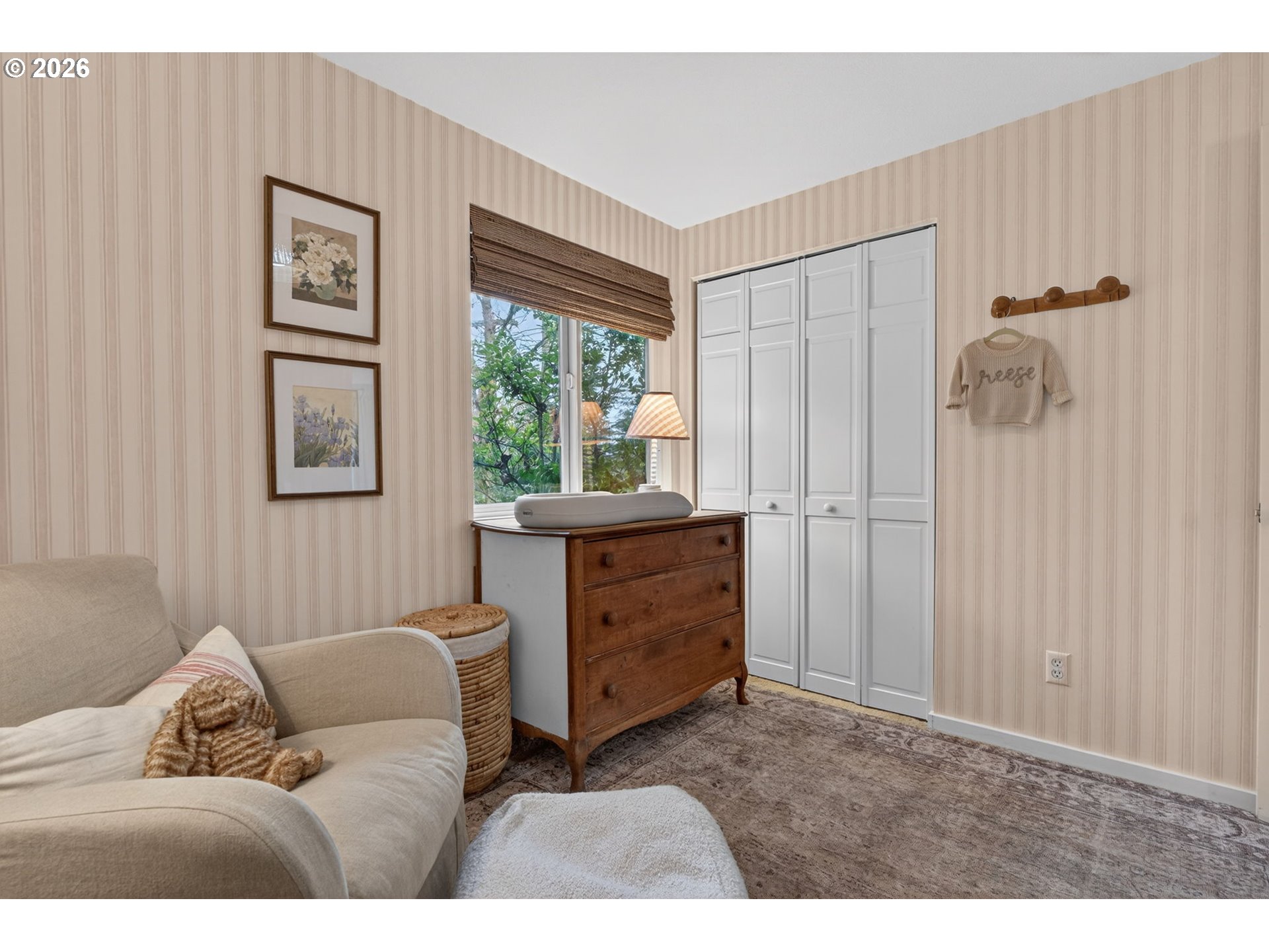 9843 Southwest 2nd Avenue Portland, OR 97219 - Photo 24 of 38 a living room with furniture and a window