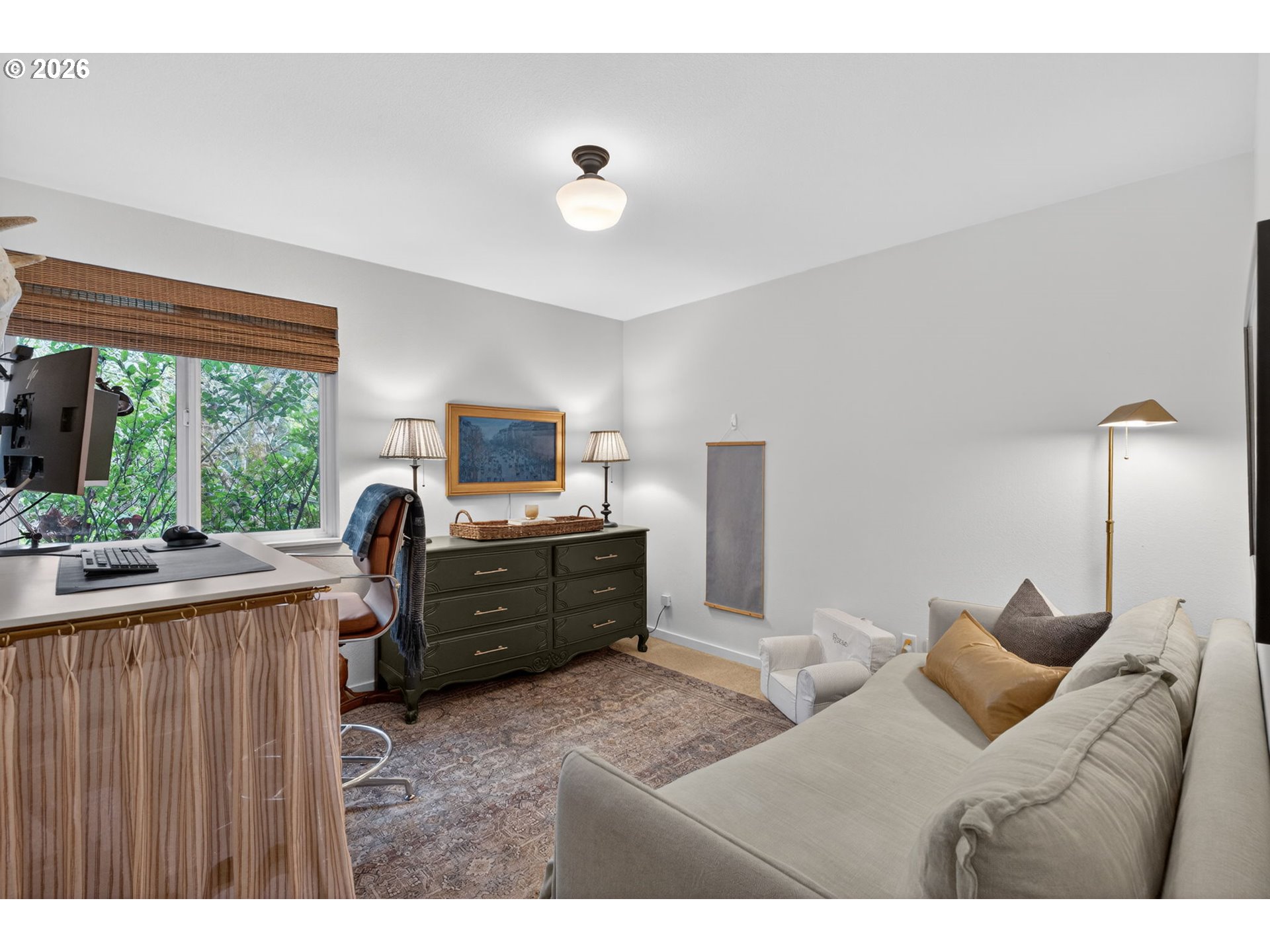 9843 Southwest 2nd Avenue Portland, OR 97219 - Photo 26 of 38 a living room with furniture and a flat screen tv