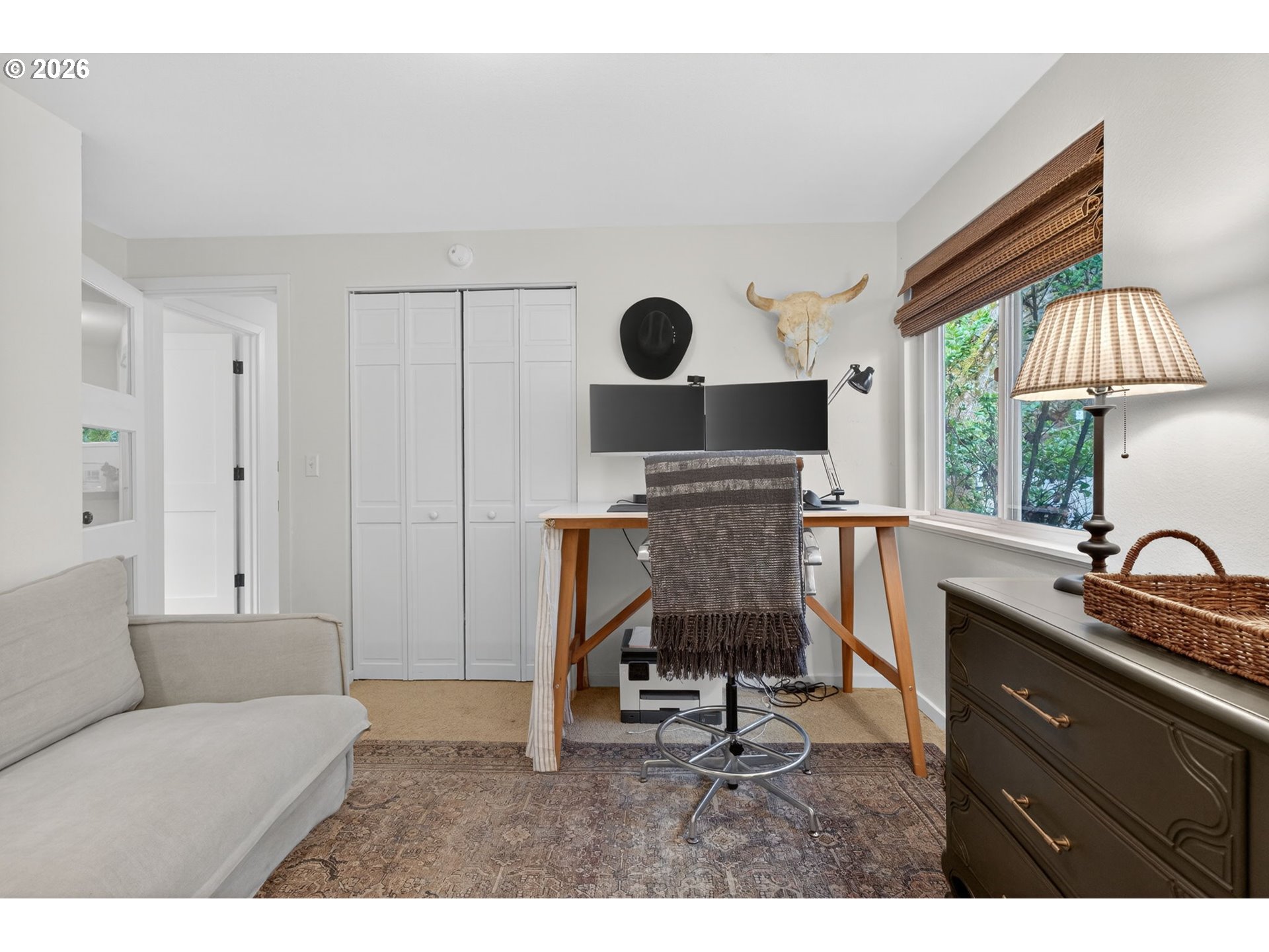 9843 Southwest 2nd Avenue Portland, OR 97219 - Photo 27 of 38 a living room with furniture and a table