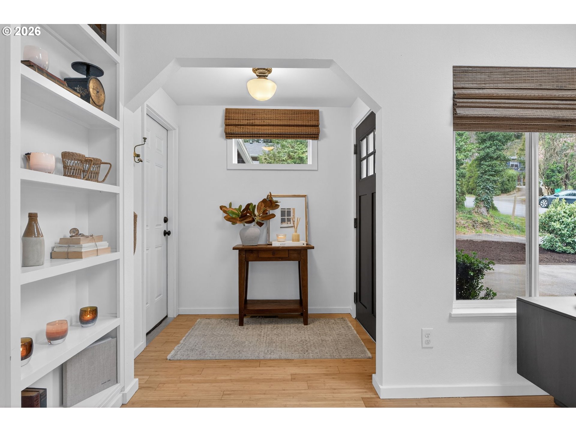 9843 Southwest 2nd Avenue Portland, OR 97219 - Photo 4 of 38 a bedroom with furniture and a window