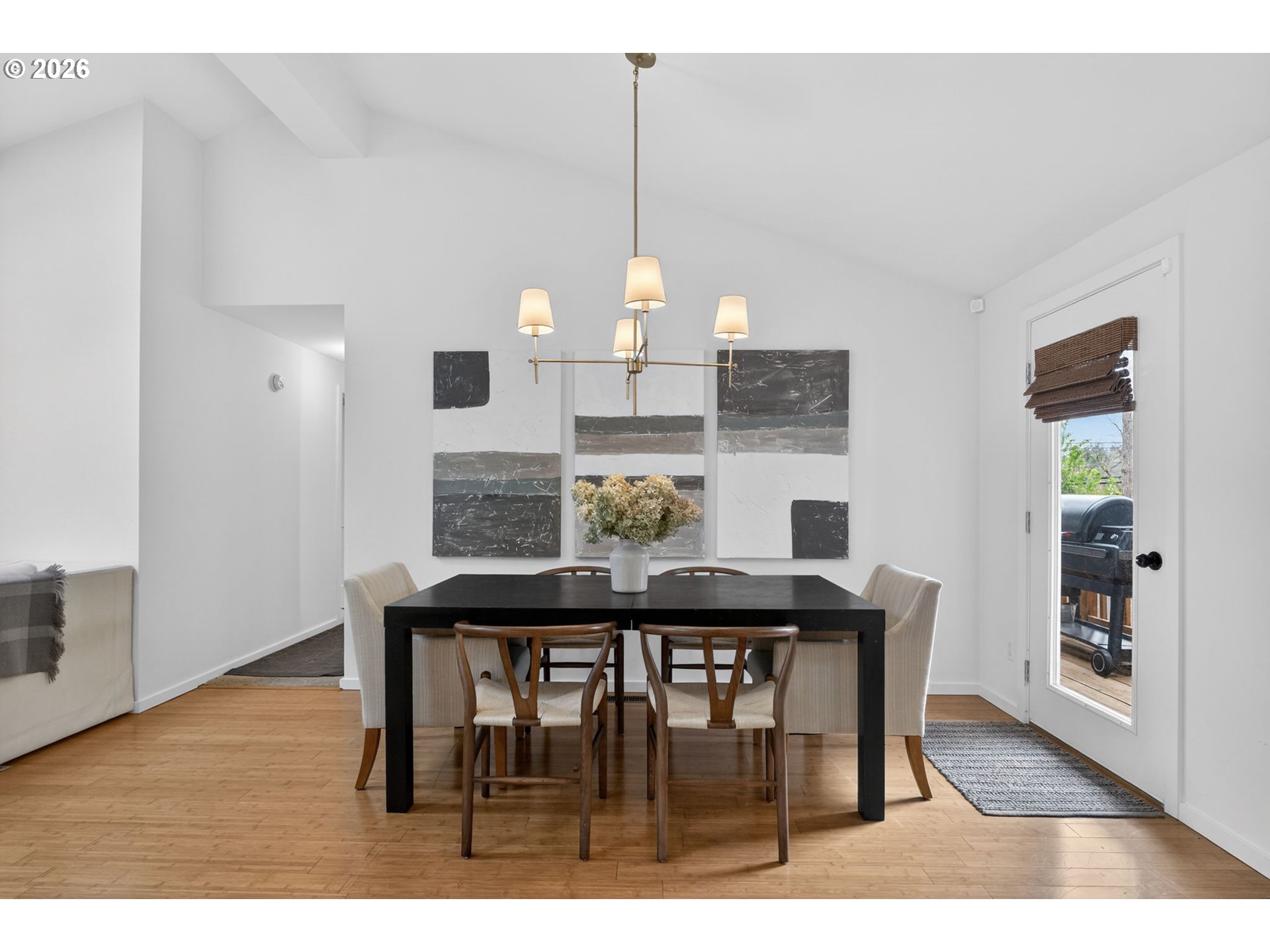 9843 Southwest 2nd Avenue Portland, OR 97219 - Photo 9 of 38 a view of a dining room with furniture and wooden floor