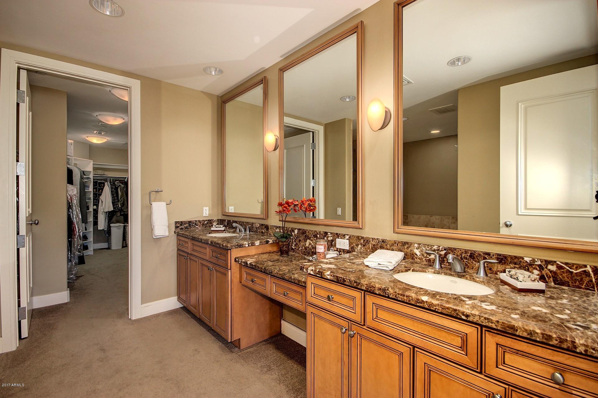 2211 East Camelback Road, Unit 208 Phoenix, AZ 85016 - Photo 49 of 67 Master Bathroom to Walk-in Closet