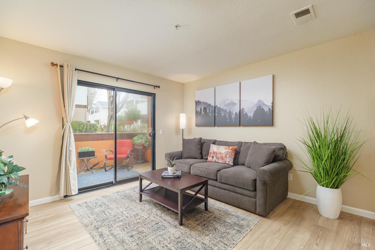 8201 Camino Colegio, Unit 123 Rohnert Park, CA 94928 - Photo 3 of 21 New luxury vinyl wide-plank flooring.