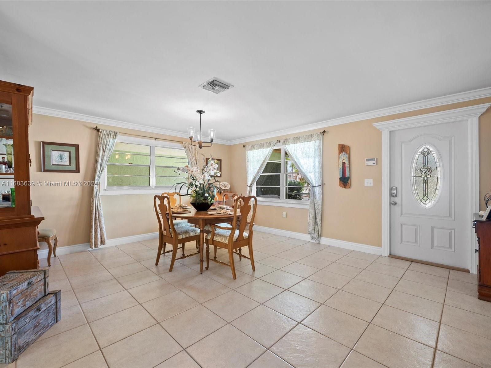368 Church Road Tequesta, FL 33469 - Photo 6 of 20 a dining room with furniture and window