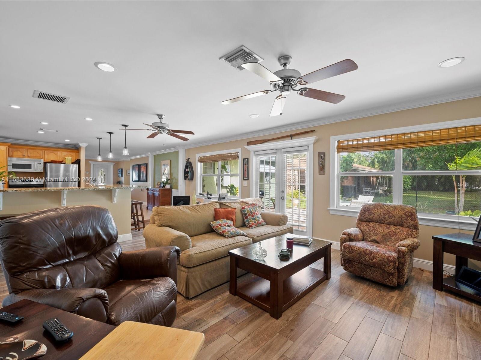 368 Church Road Tequesta, FL 33469 - Photo 10 of 20 a living room with furniture and a large window