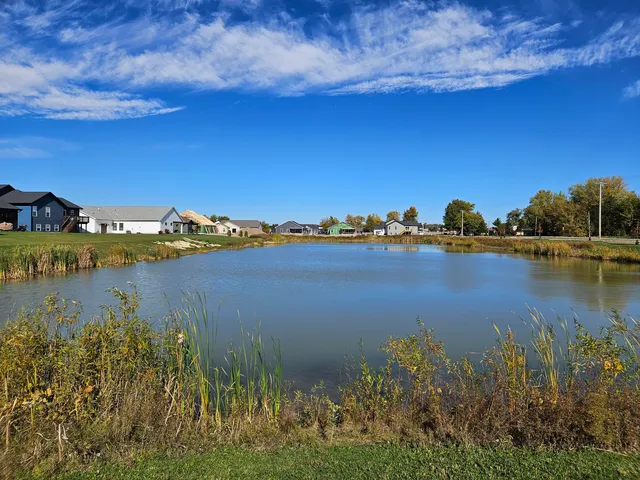 a view of a lake with a city