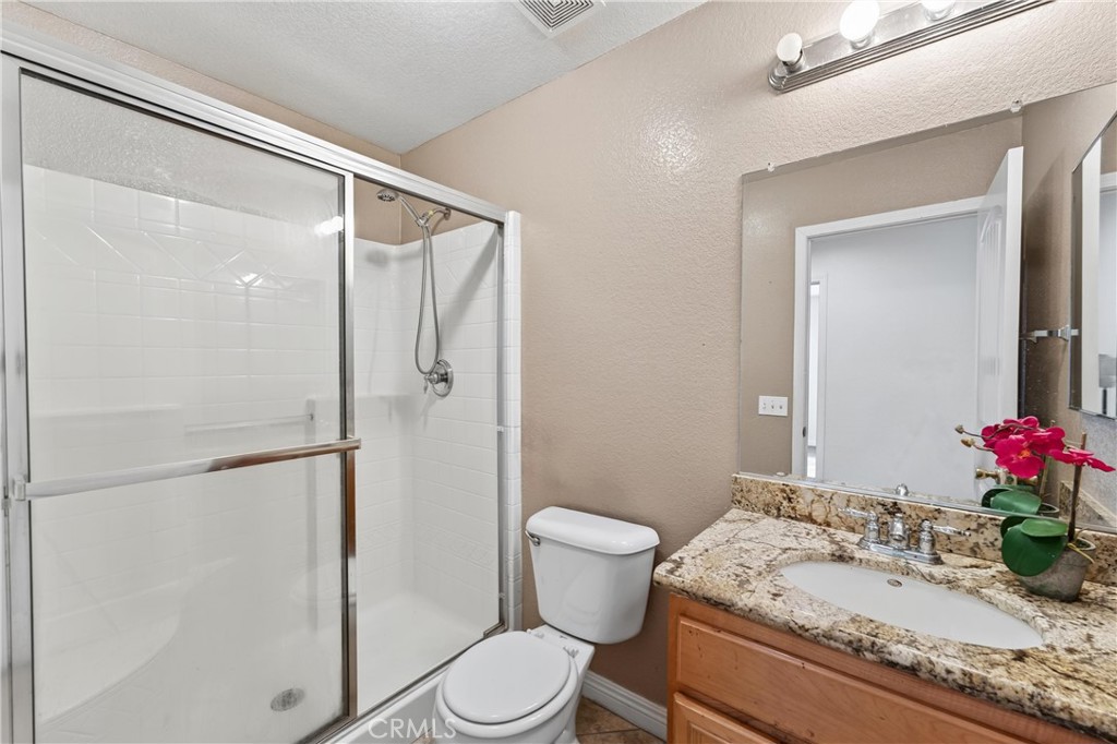 9406 Kentfield Court Riverside, CA 92508 - Photo 24 of 64 Main-level full bathroom perfect for guests or family