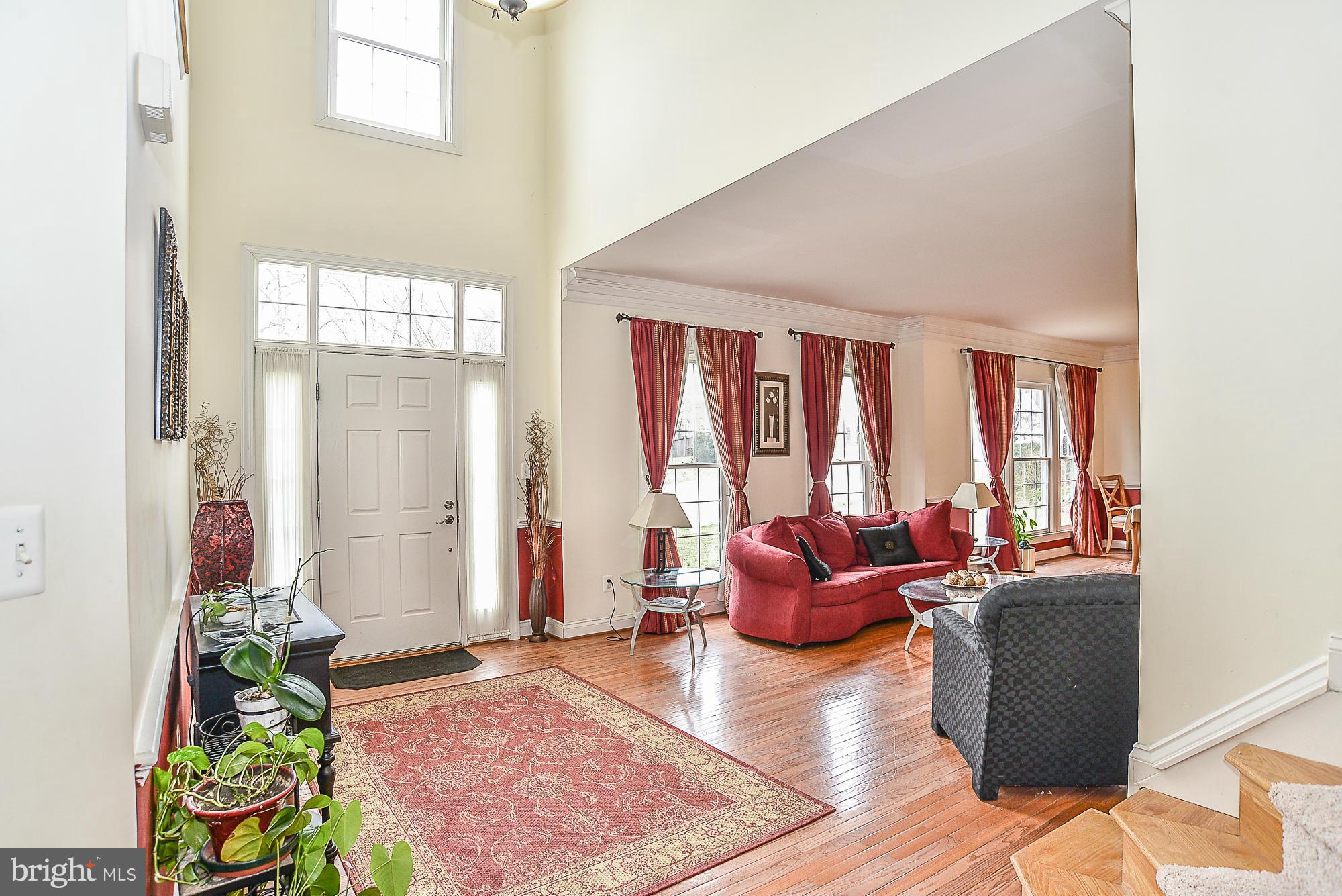 8747 Center Road Springfield, VA 22152 - Photo 2 of 30 view of living room filled with furniture