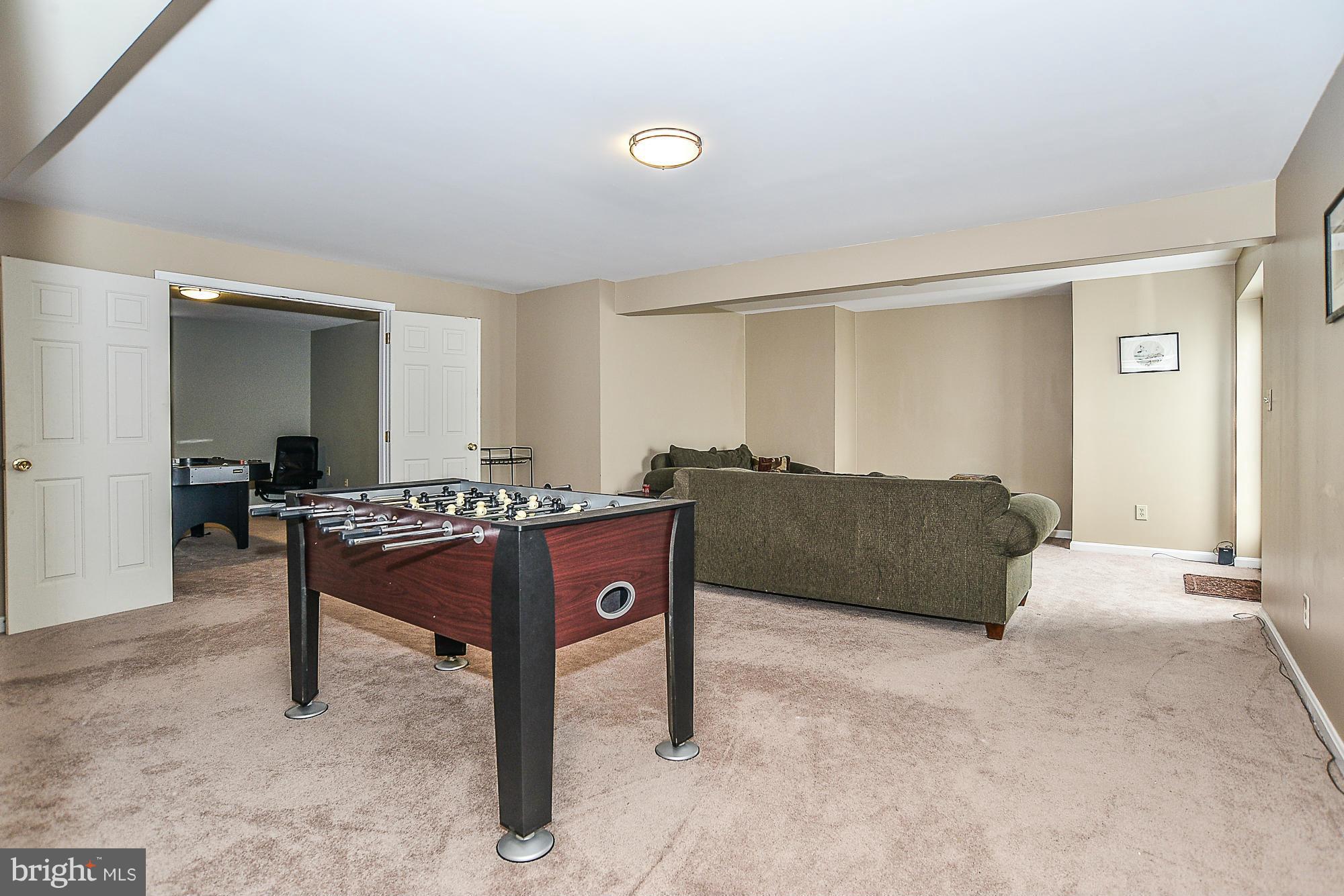 8747 Center Road Springfield, VA 22152 - Photo 24 of 30 a living room with furniture