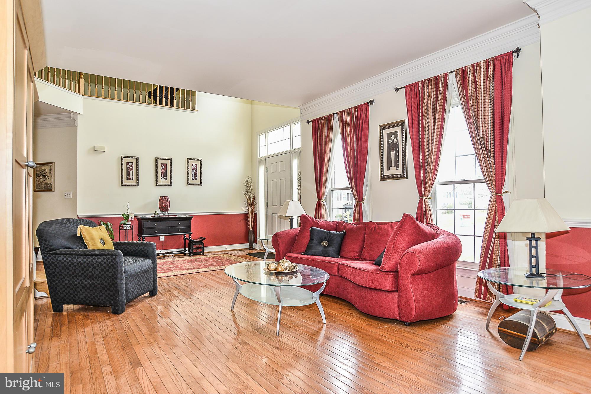 8747 Center Road Springfield, VA 22152 - Photo 6 of 30 a living room with furniture or couch and a window