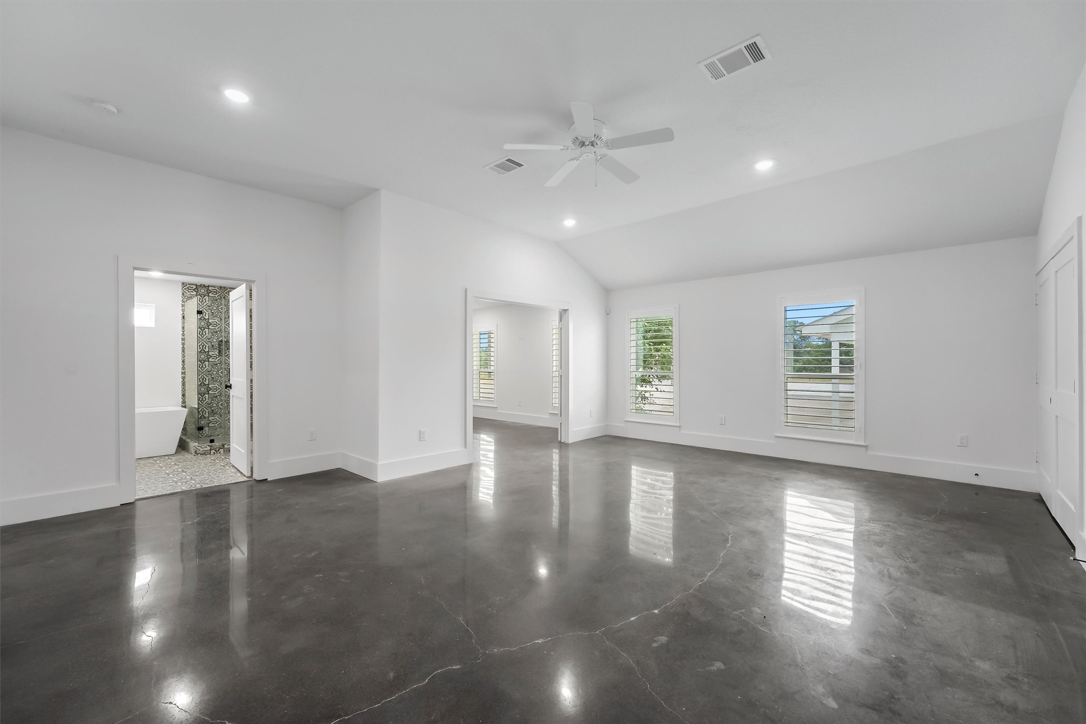 1589 County Road 252 Anderson, TX 77830 - Photo 33 of 50 an empty room with wooden floor and windows