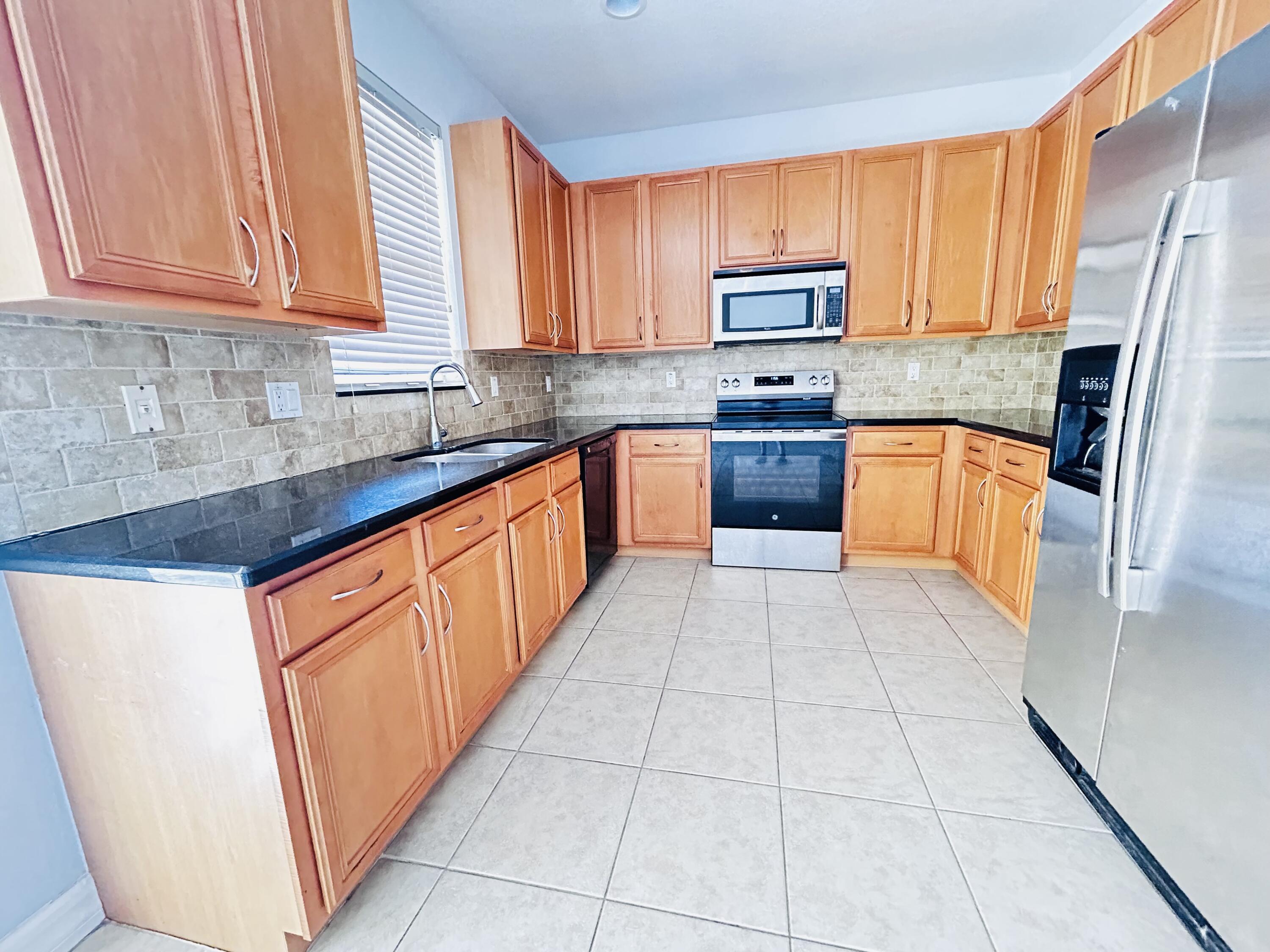 119 Ennis Lane Jupiter, FL 33458 - Photo 3 of 29 IMG_0214