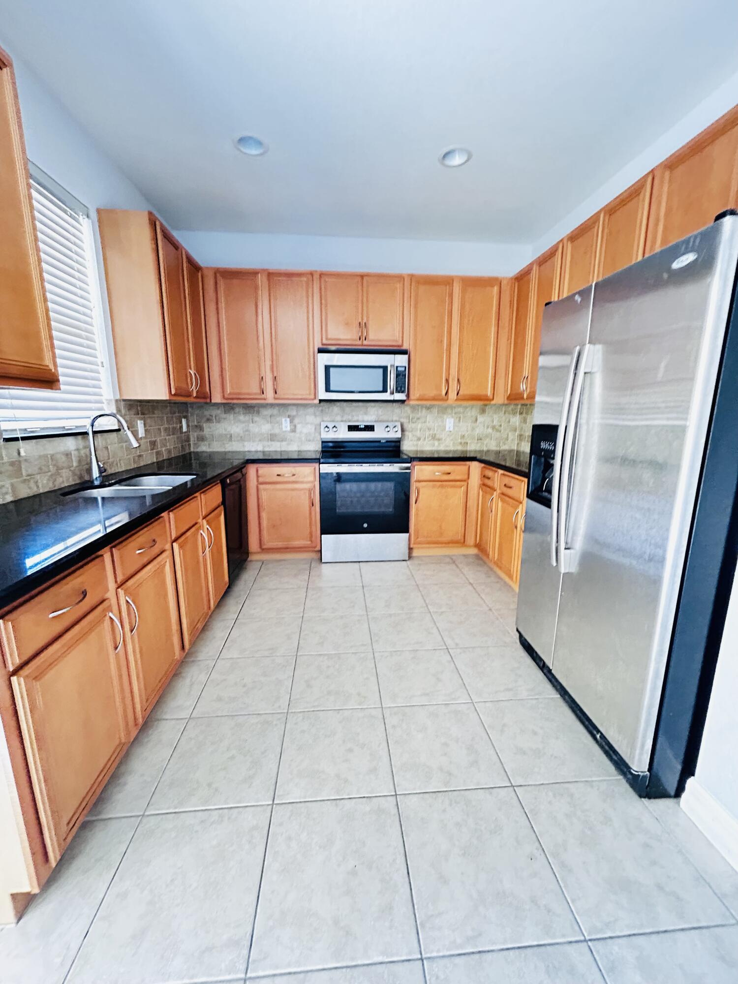 119 Ennis Lane Jupiter, FL 33458 - Photo 7 of 29 IMG_0205