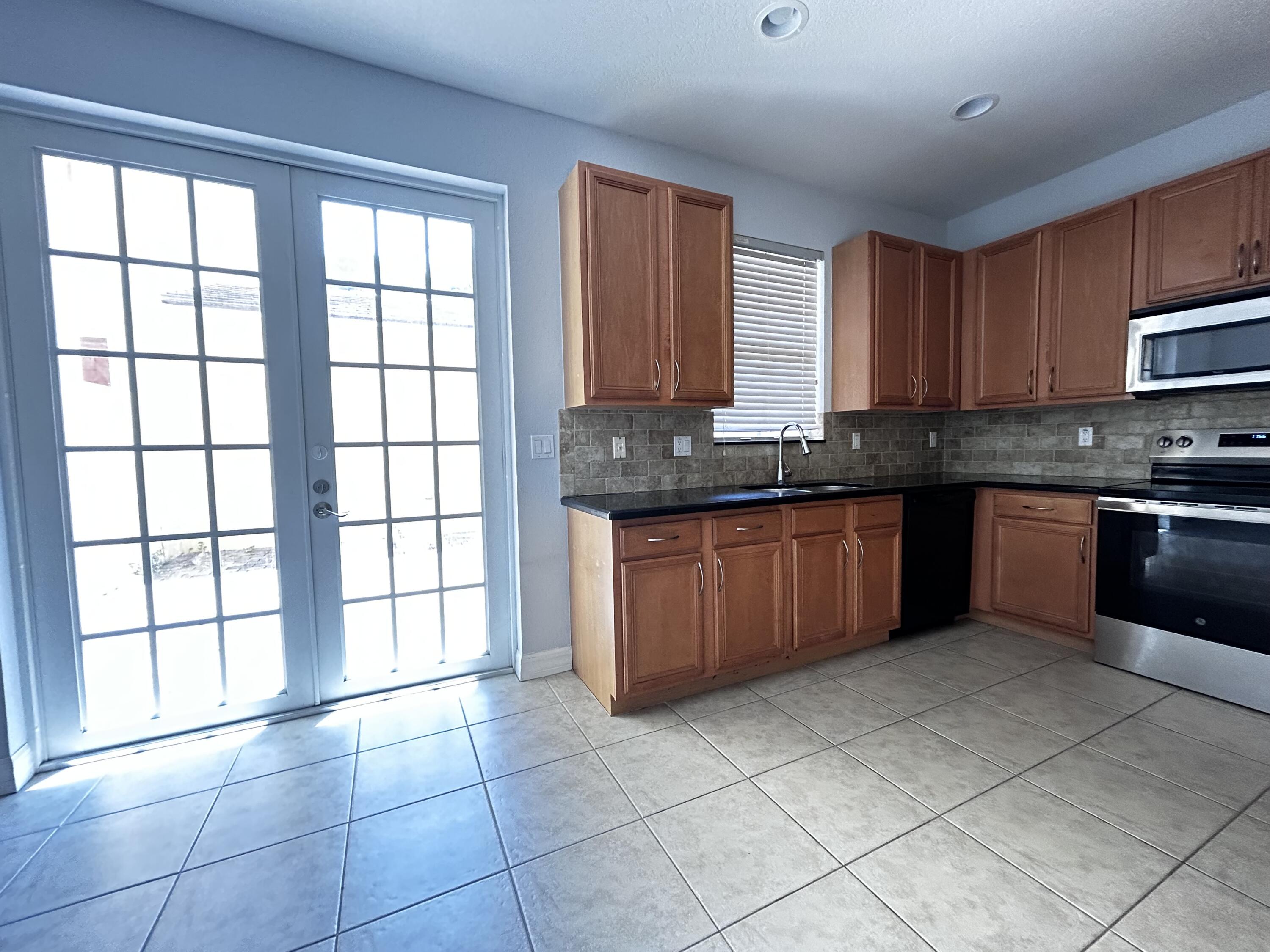 119 Ennis Lane Jupiter, FL 33458 - Photo 8 of 29 IMG_0212