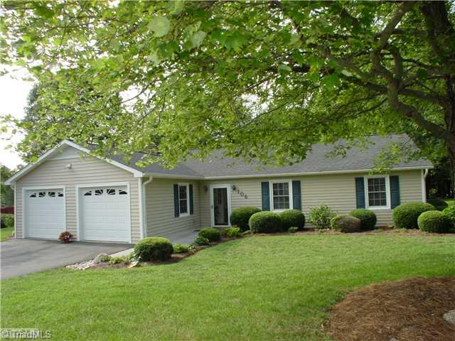 Exterior Front. 106 Applegate has beautiful curb appeal and manicured landscaping.