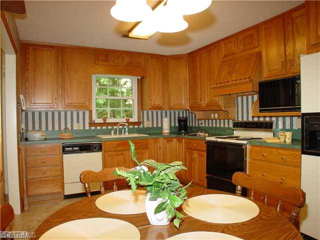 Kitchen. Plenty of cabinets in this eatin kitchen.
