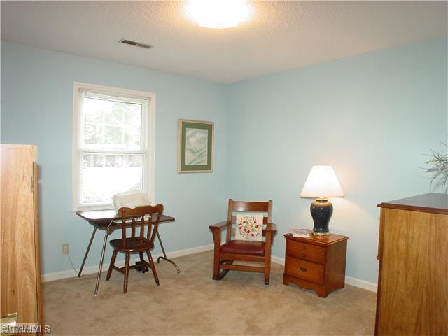 106 Applegate Road Kernersville, NC 27284 - Photo 10 of 16 3rd Bedroom. This room is currently used as a reading and craft room. Also a generous sized room.